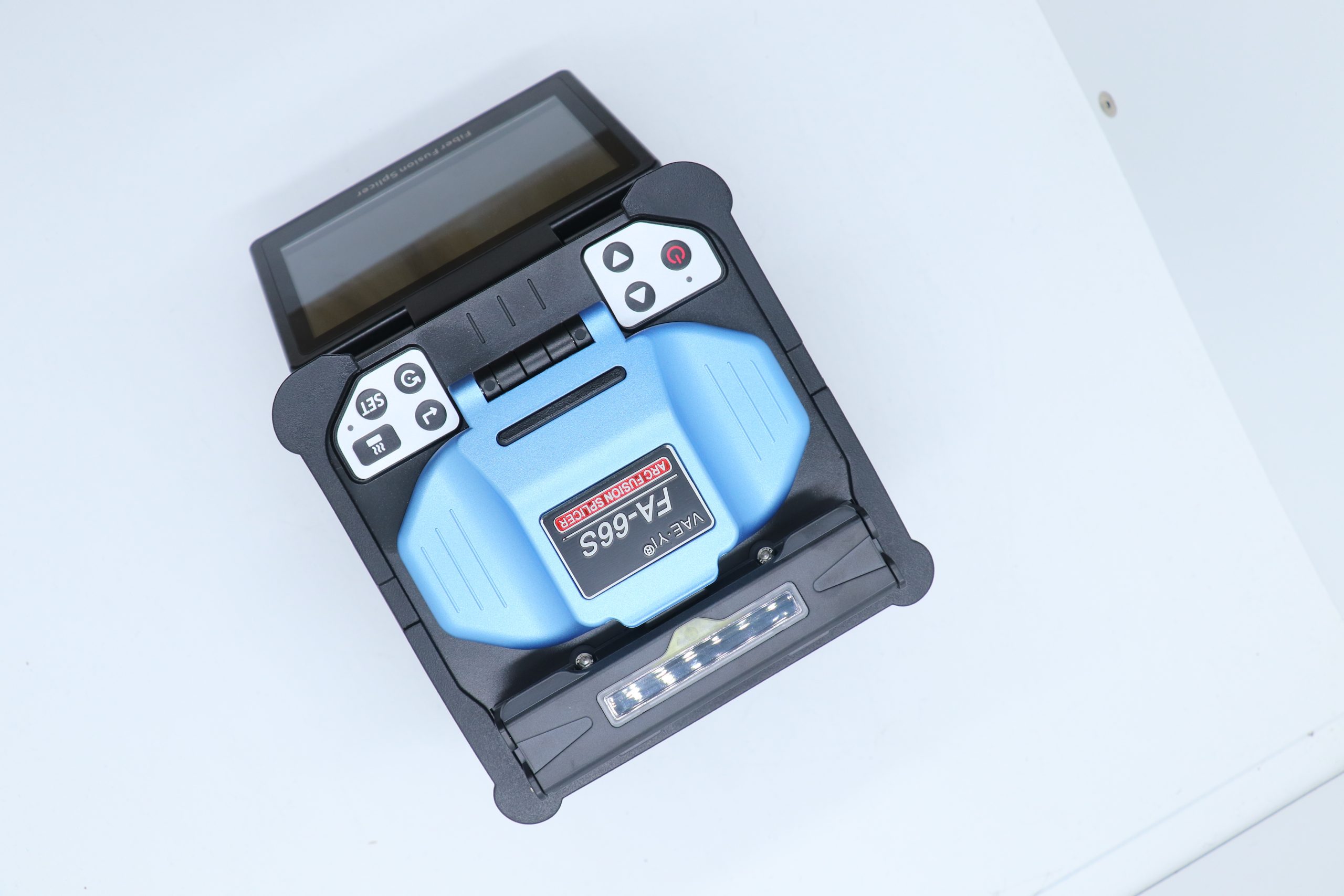 How Does a Fusion Splicer Work? Breaking Down the Process 2 How Does a Fusion Splicer Work? Breaking Down the Process VAEYI FA-66S six-motor core alignment fusion splicer front view showing blue body and 5-inch touchscreen display
