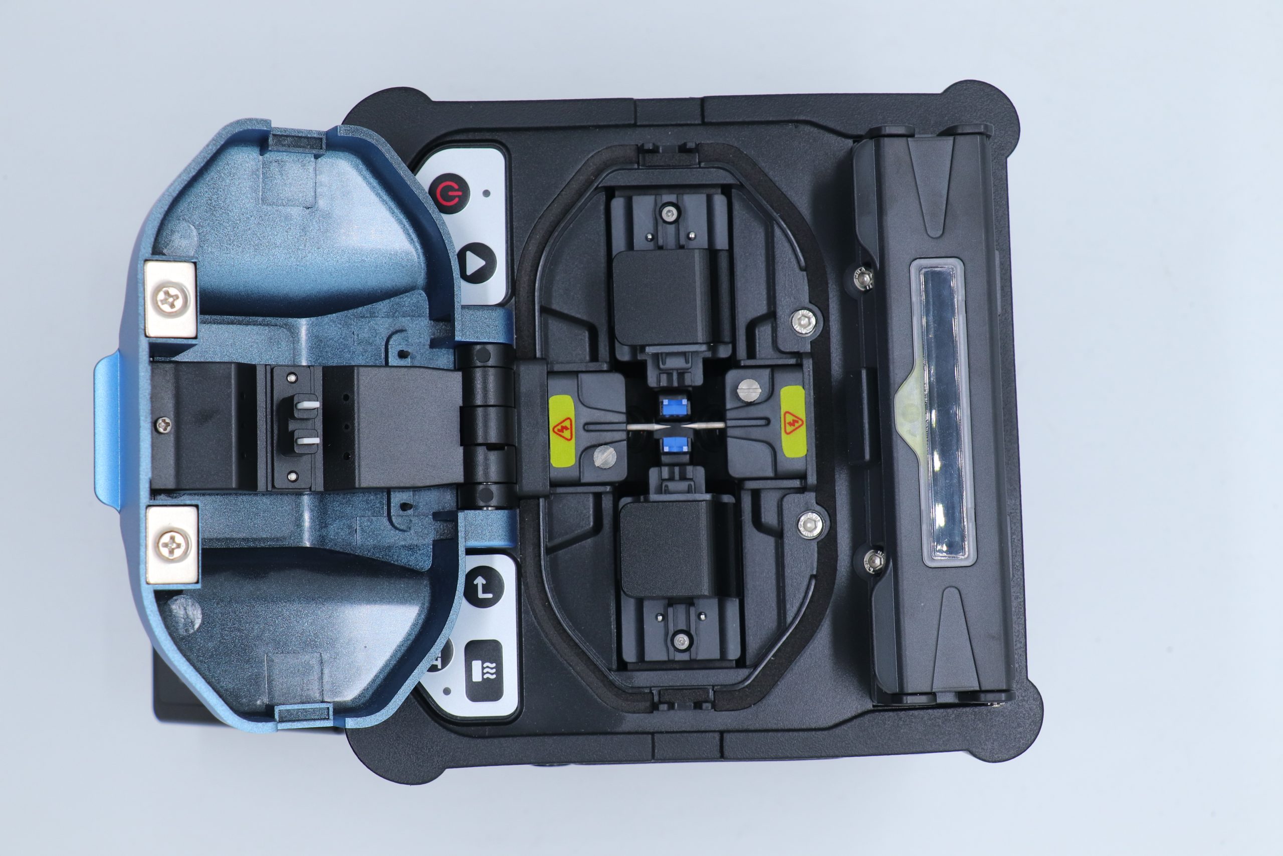 How Does a Fusion Splicer Work? Breaking Down the Process 3 How Does a Fusion Splicer Work? Breaking Down the Process VAEYI FA-66S fusion splicer internal mechanism with V-groove electrodes and fiber alignment area visible from top